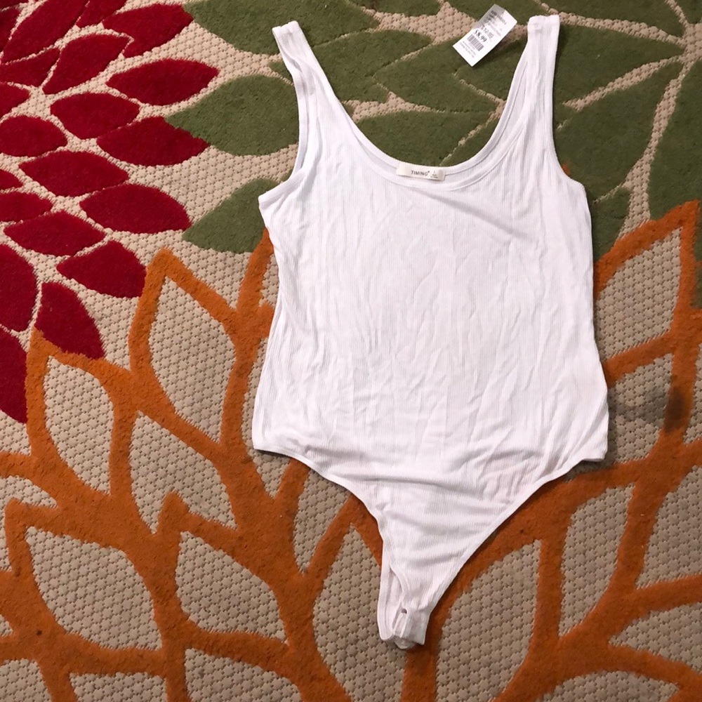 Snap bottom thong body suit